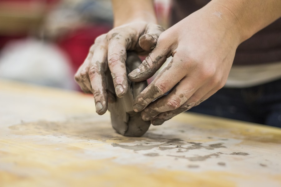 A potter shaping clay by hand
